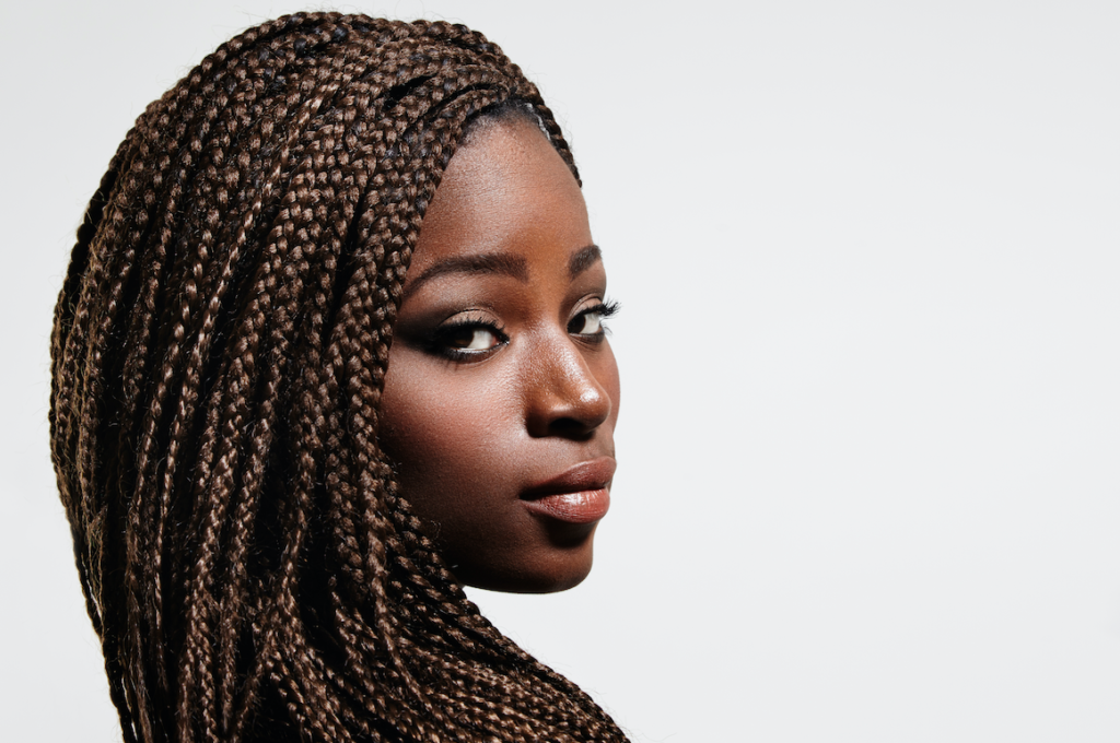 Beautiful African American woman with her hair bound in box braids